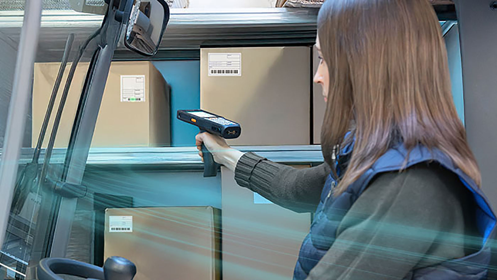 Datalogic's Skorpio X40/45 in action scanning warehouse goods. The detachable pistol grip allows operators to comfortably use the device with one hand. Datalogic's Skorpio X40/45 in action scanning warehouse goods. The detachable pistol grip allows operators to comfortably use the device with one hand.